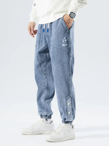 Men's Tapered Drawstring Cuffed Textured Jeans in Blue